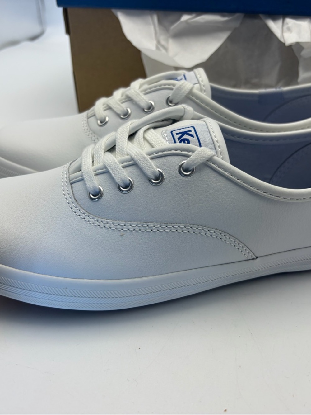 Keds White Leather Slip-On Sneakers with Blue Insoles
